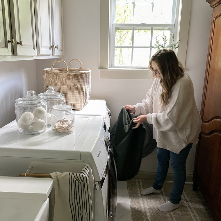 Machine-washable sectional cover going into a home washing machine